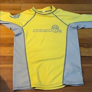yellow rash guard